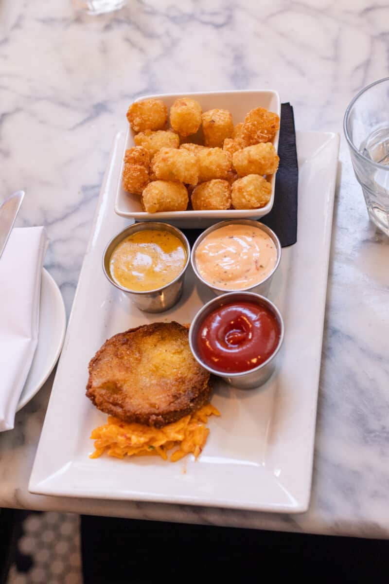 Appetizer foods and dips on table.
